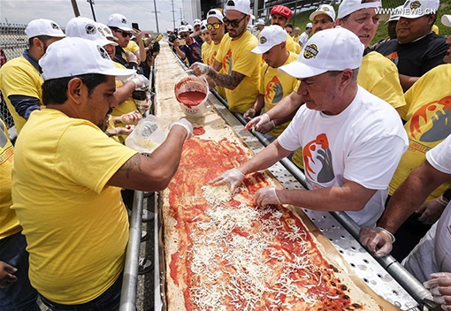 طولانی‌ترین پیتزا رکورد گینس را شکست+ عکس